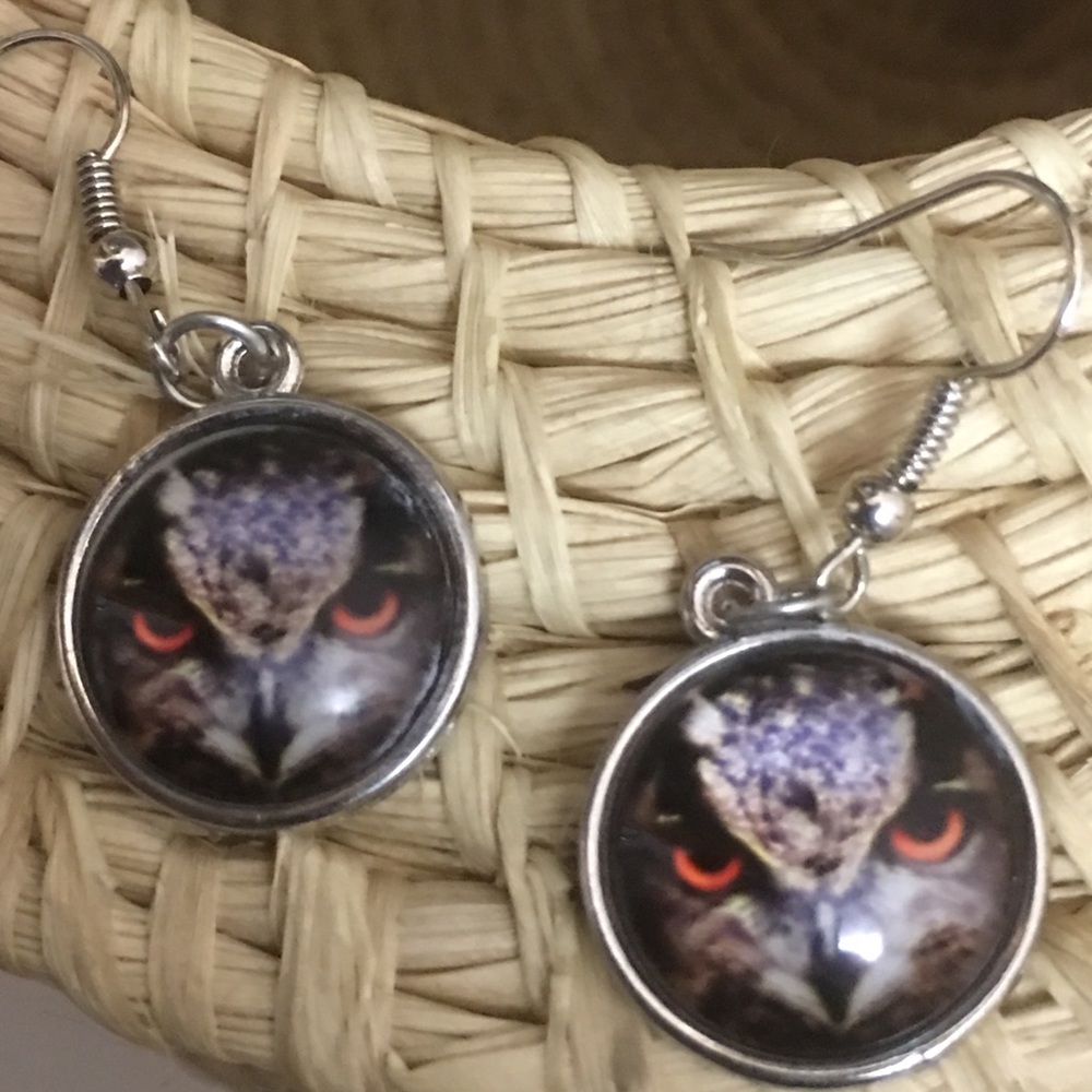 Raptor face earrings